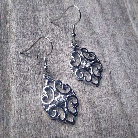 Jewelry - Knot Style Earrings - Silver Color
